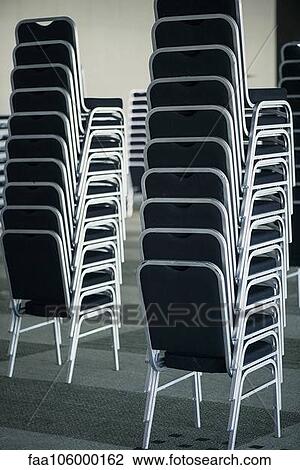 Stack of chairs View Large Photo Image Stock Image - Stack of chairs. Fotosearch