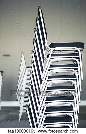 Stack of chairs View Large Photo Image Stock Photography - Stack of chairs. Fotosearch