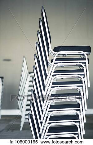 Stack of chairs View Large Photo Image Stock Photography - Stack of chairs. Fotosearch