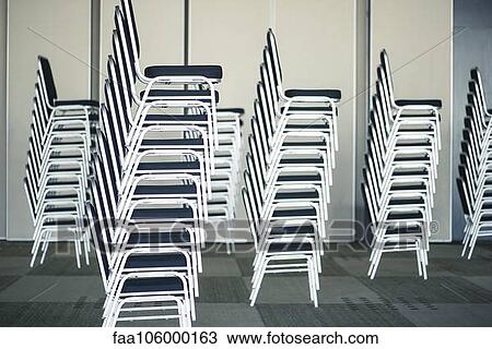 Stacks of chairs View Large Photo Image Stock Image - Stacks of chairs. Fotosearch