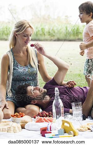 Summer picnic in the park with family View Large Photo Image Stock Photo - Summer picnic in the park with family. Fotosearch