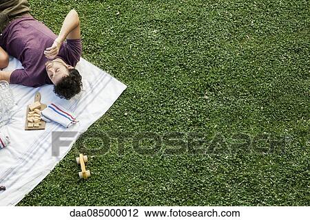 Summer picnic in the park with friends View Large Photo Image Stock Image - Summer picnic in the park with friends. Fotosearch