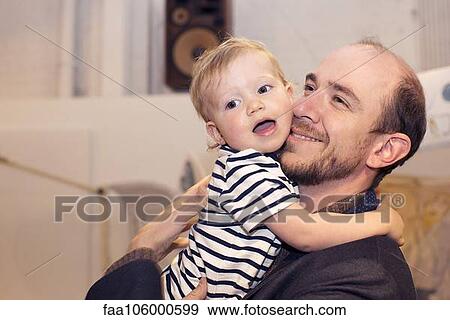 Toddler hugging father View Large Photo Image Stock Photo - Toddler hugging father. Fotosearch