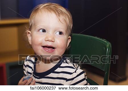 Stock Photo - Toddler, portrait. Fotosearch
