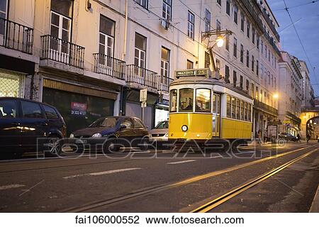 Stock Image - Tram in the street of Lisbon, Portugal. Fotosearch
