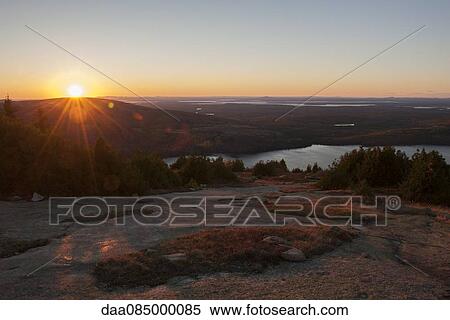 Tranquil sunset in Acadia National Park, Maine, USA View Large Photo Image Stock Photography - Tranquil sunset in Acadia National Park, Maine, USA. Fotosearch