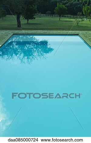 Tranquil swimming pool View Large Photo Image Picture - Tranquil swimming pool. Fotosearch