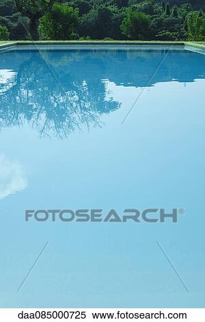 Tranquil swimming pool View Large Photo Image Stock Photography - Tranquil swimming pool. Fotosearch