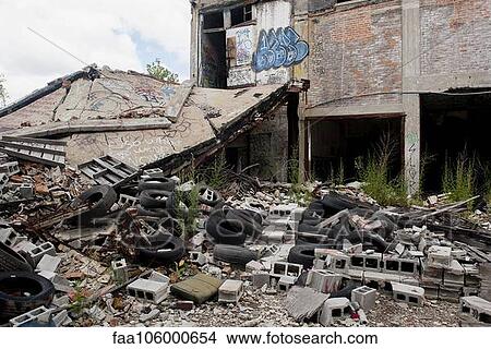 Trash and rubble heaped beside abandoned building in Detroit, Michigan, USA View Large Photo Image Picture - Trash and rubble heaped beside abandoned building in Detroit, Michigan, USA. Fotosearch
