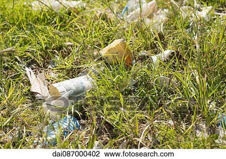 Trash littered on the ground View Large Photo Image Stock Image - Trash littered on the ground. Fotosearch