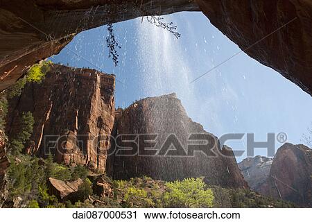 USA, Utah, Zion National Park, view from behind a waterfall View Large Photo Image Stock Image - USA, Utah, Zion National Park, view from behind a waterfall. Fotosearch