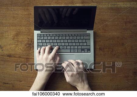 Using laptop computer View Large Photo Image Stock Image - Using laptop computer. Fotosearch
