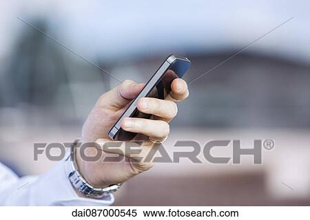 Using smartphone, close-up View Large Photo Image Stock Photography - Using smartphone, close-up. Fotosearch