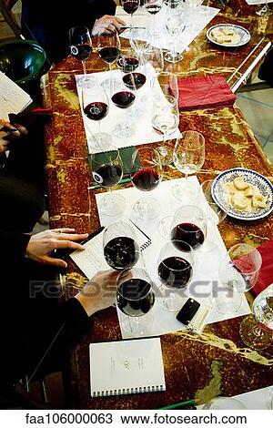 Wine testers taking notes during wine tasting View Large Photo Image Stock Image - Wine testers taking notes during wine tasting. Fotosearch