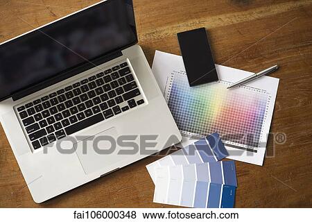 Wireless devices making design projects easier than ever View Large Photo Image Stock Photo - Wireless devices making design projects easier than ever. Fotosearch