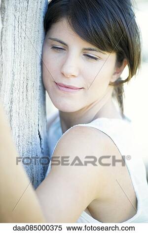 Woman hugging tree View Large Photo Image Stock Photography - Woman hugging tree. Fotosearch