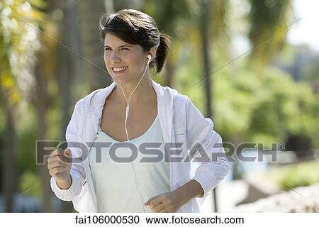 Stock Image - Woman jogging. Fotosearch