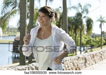 Woman jogging View Large Photo Image Stock Photography - Woman jogging. Fotosearch