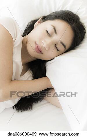 Woman sleeping peacefully View Large Photo Image Stock Photo - Woman sleeping peacefully. Fotosearch
