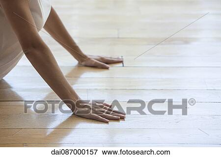 Woman stretching in cobra pose, cropped View Large Photo Image Stock Photo - Woman stretching in cobra pose, cropped. Fotosearch