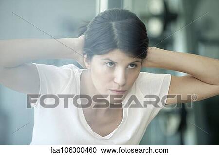 Stock Image - Woman working out. Fotosearch