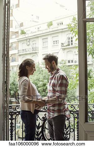 Young couple expecting child View Large Photo Image Stock Photograph - Young couple expecting child. Fotosearch