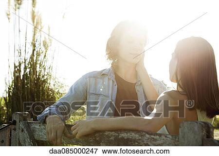 Young couple in love View Large Photo Image Stock Photo - Young couple in love. Fotosearch