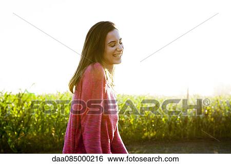 Young woman laughing View Large Photo Image Stock Photograph - Young woman laughing. Fotosearch