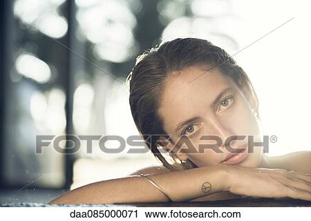 Young woman, portrait View Large Photo Image Stock Image - Young woman, portrait. Fotosearch