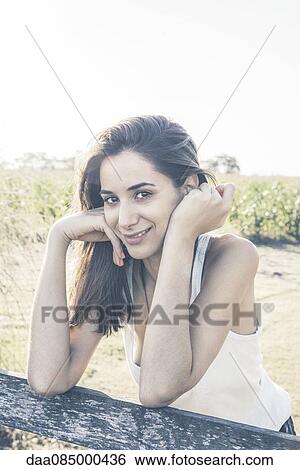 Young woman, portrait View Large Photo Image Stock Photograph - Young woman, portrait. Fotosearch