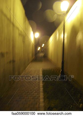 Empty alleyway at night View Large Photo Image Stock Image - Empty alleyway at night. Fotosearch