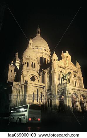Stock Image - France, Paris, Montmartre, Sacre Coeur at night. Fotosearch