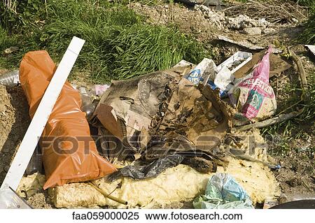 Stock Photography - Garbage piled up outdoors. Fotosearch