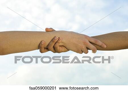 Holding hands View Large Photo Image Stock Image - Holding hands. Fotosearch