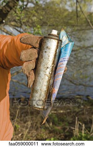 Holding rusty spray bottle View Large Photo Image Stock Image - Holding rusty spray bottle. Fotosearch