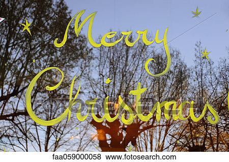 Merry Christmas painted on window View Large Photo Image Stock Photo - Merry Christmas painted on window. Fotosearch