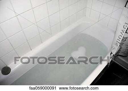 Soap suds forming heart shape in bathtub View Large Photo Image Stock Image - Soap suds forming heart shape in bathtub. Fotosearch