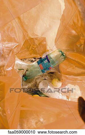 Stock Image - Trash in garbage bag. Fotosearch