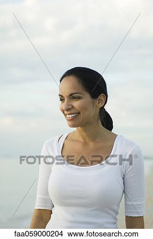 Woman at the beach, portrait View Large Photo Image Picture - Woman at the beach, portrait. Fotosearch