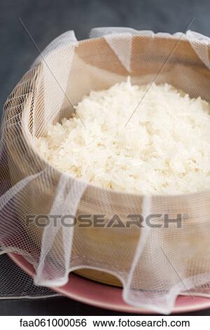 Glutinous rice in steamer basket View Large Photo Image Stock Photograph - Glutinous rice in steamer basket. Fotosearch