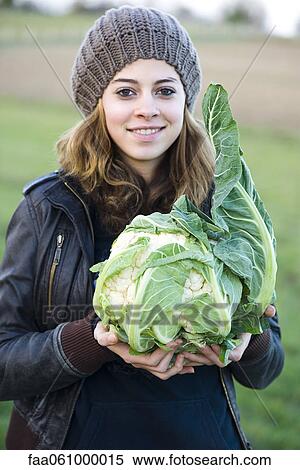 Holding fresh cauliflower View Large Photo Image Stock Photography - Holding fresh cauliflower. Fotosearch