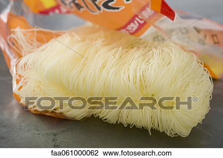 Open cellophane package of vermicelli View Large Photo Image Stock Image - Open cellophane package of vermicelli. Fotosearch