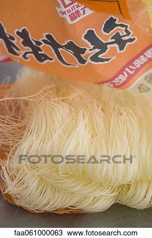 Open cellophane package of vermicelli View Large Photo Image Stock Image - Open cellophane package of vermicelli. Fotosearch