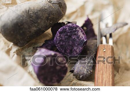 Purple potatoes View Large Photo Image Stock Photo - Purple potatoes. Fotosearch