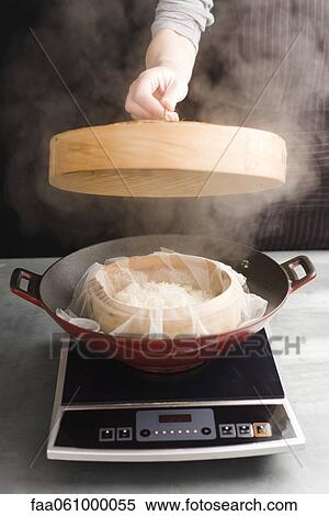 Steaming glutinous rice View Large Photo Image Stock Photography - Steaming glutinous rice. Fotosearch
