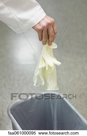 Throwing away disposable latex gloves View Large Photo Image Stock Photography - Throwing away disposable latex gloves. Fotosearch