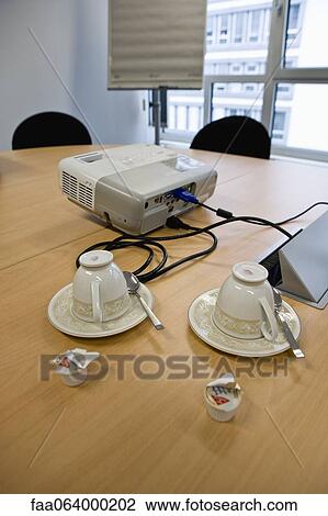 Coffee cups on conference table View Large Photo Image Stock Image - Coffee cups on conference table. Fotosearch