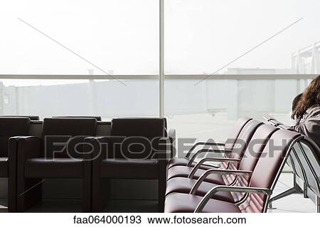 Empty seats in airport terminal View Large Photo Image Stock Image - Empty seats in airport terminal. Fotosearch
