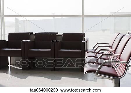 Empty seats in airport terminal View Large Photo Image Stock Image - Empty seats in airport terminal. Fotosearch
