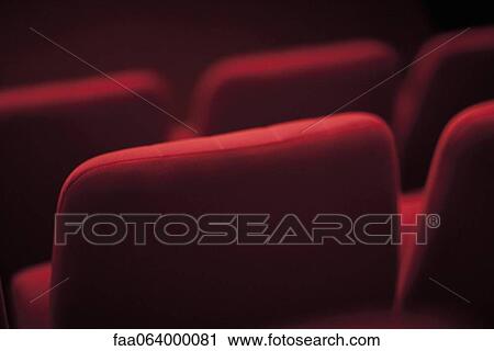 Stock Image - Empty theater seats, cropped. Fotosearch
